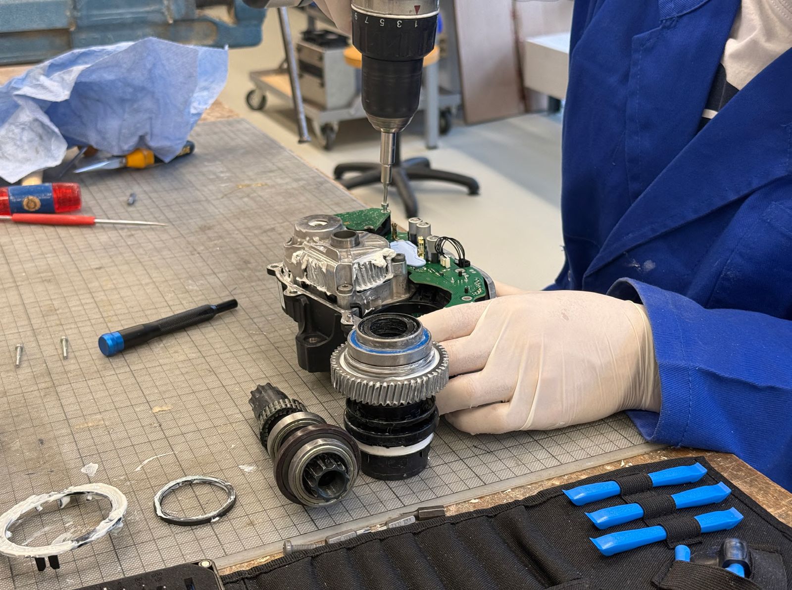 Disassembling an e-bike motor on a workbench